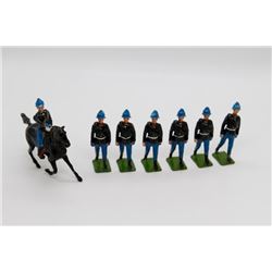 Soldiers in Black Coats and Helmets, Blue Pants, 1 Horse