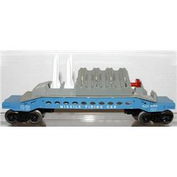 LIONEL MISSILE FIRING CAR. BROKEN BRAKE WHEELS