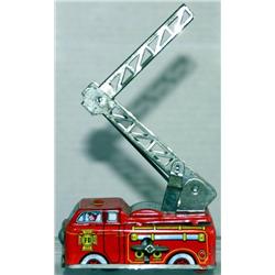 YONE MADE IN JAPAN TIN LITHO WIND-UP FIRE TRUCK. 