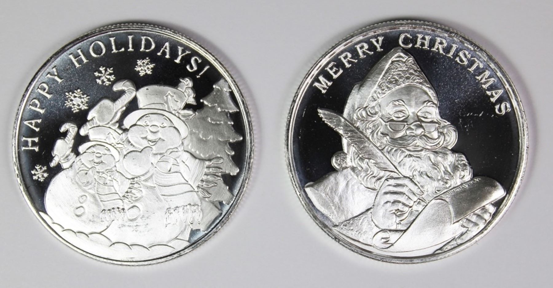 (2) DIFFERENT 2019 CHRISTMAS SILVER ROUNDS
