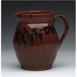 GLAZED REDWARE HANDLED PITCHER