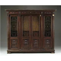 LARGE FOUR DOOR CARVED BOOKCASE