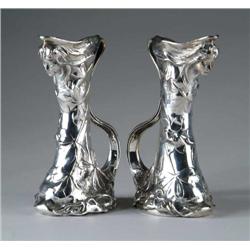 PAIR OF SILVER ART NOUVEAU PITCHERS