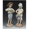 Image 1 : PAIR OF PORCELAIN BOY AND GIRL FIGURES