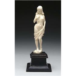 CARVED IVORY FIGURE OF A NUDE WOMAN