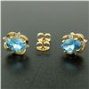 Image 2 : 14K Yellow Gold 1.18 ctw Oval Blue Topaz & Round Diamond Halo Stud Earrings