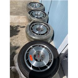Qty 4 Performance Tires on Chevy Racing Rims (Original Tires for the 1987 Corvette in Lot 30A)