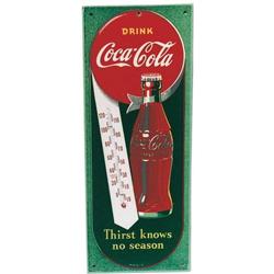 Coke masonite thermometer