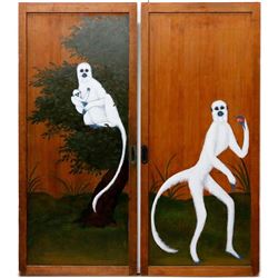 Pair of Japanese wooden doors with painted lemurs.
