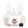 Image 1 : A collection of glass paper weights and perfumes.