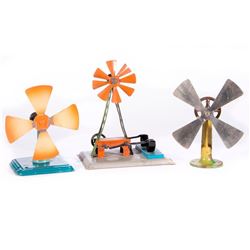 Three vintage toy fans.