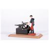 Image 3 : Toy anvil.
