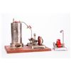 Image 3 : Vintage model steam engine and gauge.
