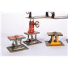 Image 2 : Seven toy factory machines.