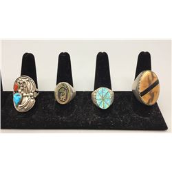 Four Sterling Silver Rings