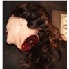 Image 2 : SEVERED SILICONE FEMALE HEAD WITH HAIR AND GORE