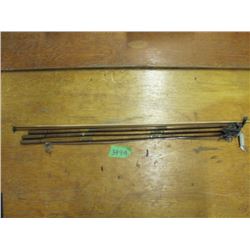 lot of miscellaneous cleaning rods