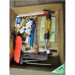 box with reamer and assorted tools