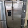 Image 1 : STAINLESS STEEL GE SIDE BY SIDE FRIDGE WITH WATER AND ICE DISPENSER TESTED AND WORKING GUARANTEED
