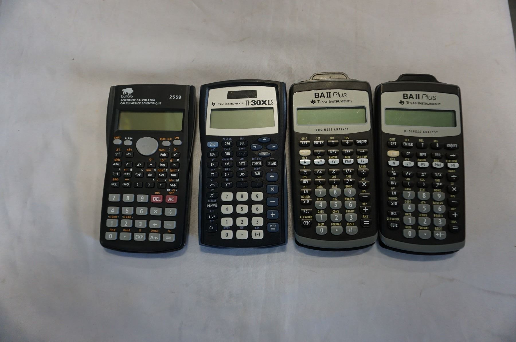 4 TEXAS INSTRUMENT CALCULATORS
