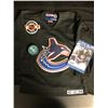 Image 1 : DANIEL & HENRIK SEDIN DUAL SIGNED CANUCKS KIDS JERSEY w/ PROGRAM & PUCK