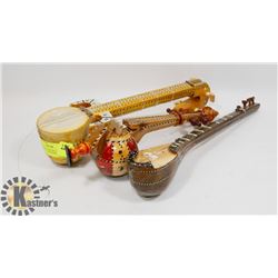3 DECORATIVE MUSICAL INSTRUMENT ORNAMENTS.