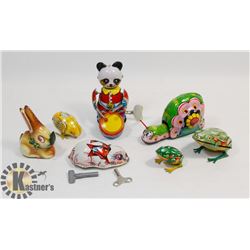 FLAT OF 7 VINTAGE TIN TOYS WITH KEYS