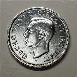 CANADIAN 25 CENTS SILVER COIN