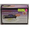 Image 1 : NEW-IN-BOX MERANGUE COUNTERFIT CURRENCY DETECTOR