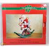 Image 1 : SANTA ON A ROCKING HORSE 18" HIGH, PAPER MACHE AND