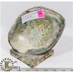 ABALONE SHELL ON STAND.