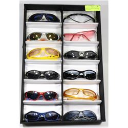 DISPLAY OF ASSORTED DESIGNER SUNGLASSES.