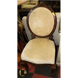 ORNATE PARLOR CHAIR WITH CHIP ON BACK FOOT