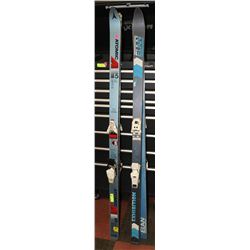 2 SETS OF ELAN AND ATOMIC SKIS.
