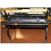 Image 1 : VINTAGE NEWSPAPER LOG ROLLER