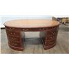 Image 1 : Rounded Wooden Desk with Drawers - Jim Nabors' Personal Desk