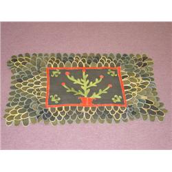 19TH CENT. PENNY RUG W/ CENTRAL PANEL W/ POTTED F