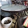 Image 2 : 4 FOLDING ROUND GLASS PATIO TABLES