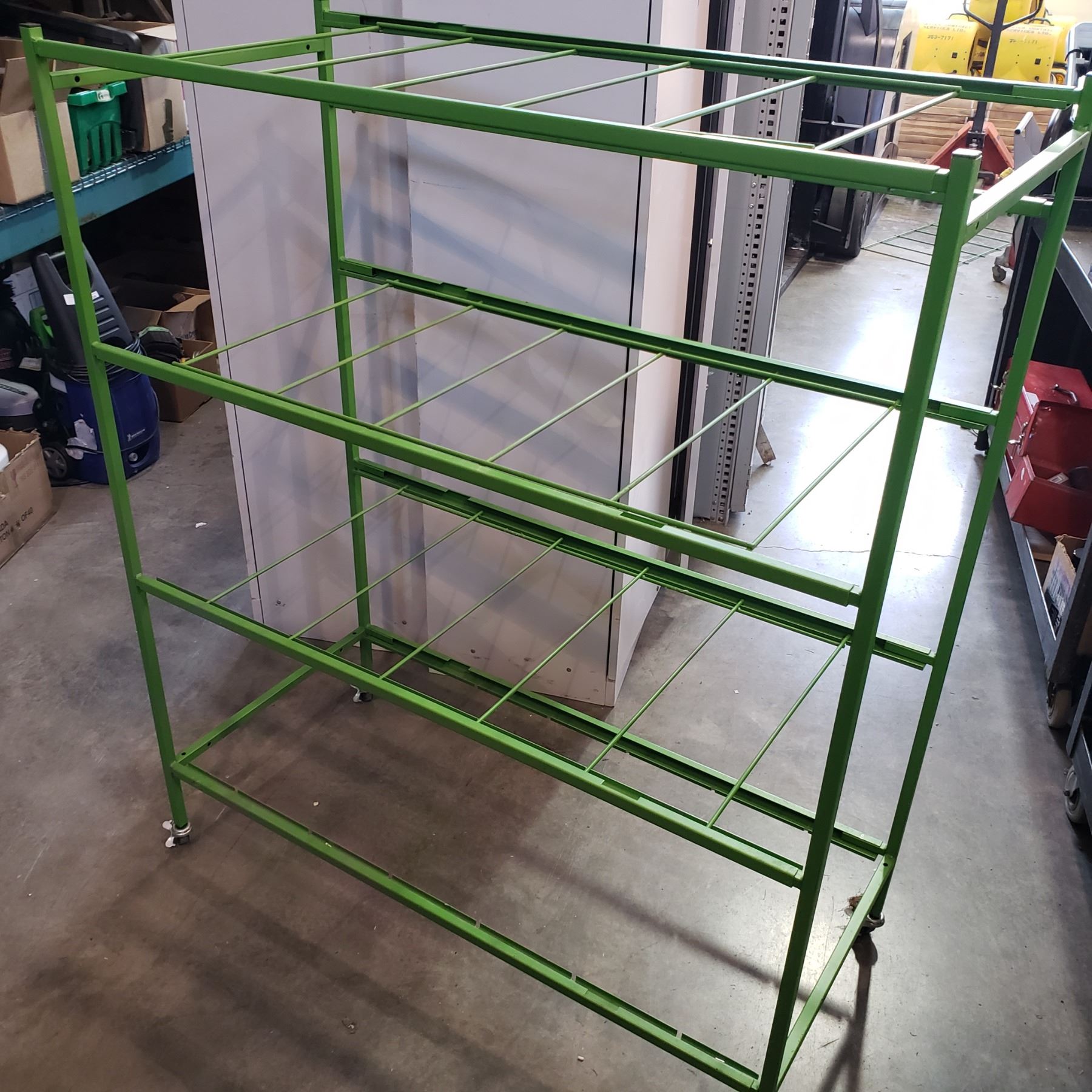 GREEN METAL ROLLING RACK