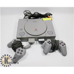 ORIGINAL PLAYSTATION WITH CORDS, TWO CONTROLLERS &