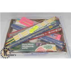 FLAT WITH KNITTING AND CROCHET NEEDLES.