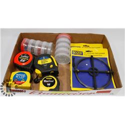 FLAT WITH TAPE MEASURES, DRAIN CLEANERS, AND MORE