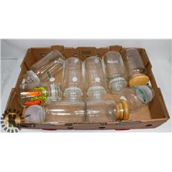 FLAT OF LIDDED STORAGE JARS