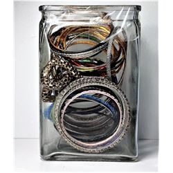 14)  GLASS BLOCK STYLE VASE CONTAINING