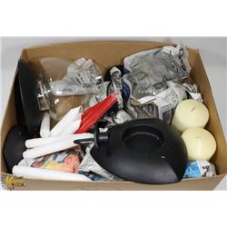 BOX OF CANDLE HOLDERS AND ASSORTED CANDLES.
