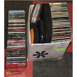 2 BOXES OF ASSORTED CDS.