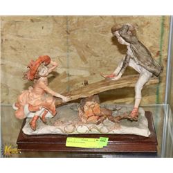 SEE SAW FIGURINE