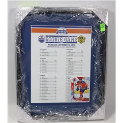 FRAMED AUTHENTIC LINEUP SHEET AND ROOKIE CARD FROM