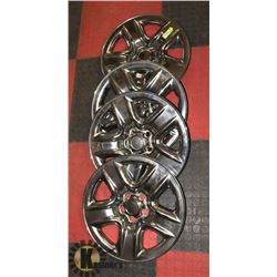 SET OF FOUR 18" WHEEL COVERS.