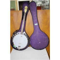 May Bell Tenor Banjo - In Good Condition - with a Case.  Approx. value $500 to $800